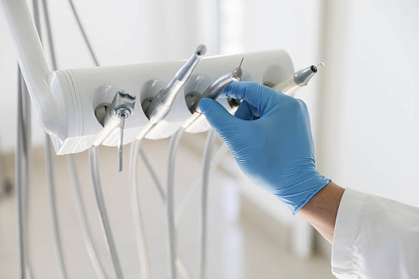 Professional Tooth Extraction technician working in Springfield, MA